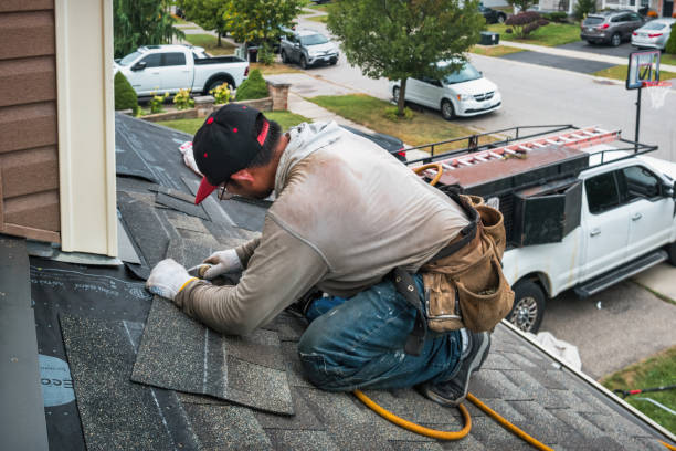 Professional Flat Roof Repair technician working in Riverton, IA